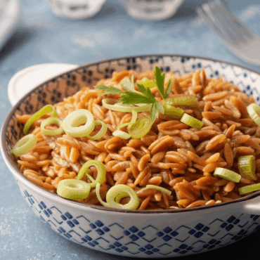 Πράσο με κριθαράκι στο φούρνο